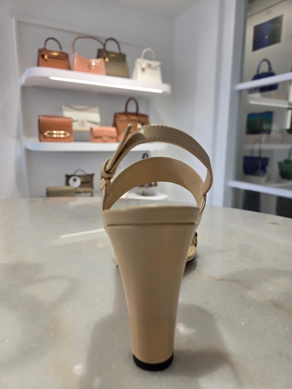 CHANEL Beige Slingback Heels with Black-and-Gold Chain